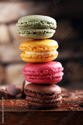 Fototapeta Naklejka Na Ścianę i Meble -  Close up colorful macarons dessert with vintage pastel tones