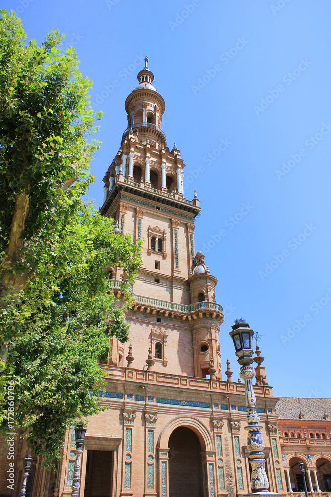 North Tower of Plaza de Espana (Spain Square) in Seville. Built for the Expo in 1929  is one of the most famous and beautiful squares in the world. Architecture detail against empty sky background