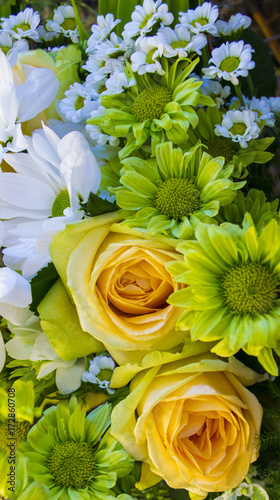 yellow roses and white chrysanthemums