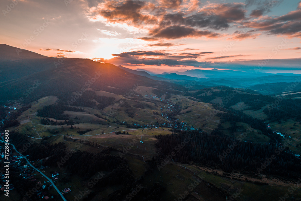 Aerial view of the village in the Carpathian mountains on the Sunset Aerial view of the village in the Carpathian mountains on the Sunset