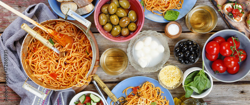 dinner  tanle. Traditional Italian dinner in the open air photo