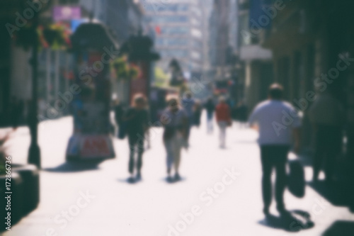     People walking in the street, blurry  © gojalia