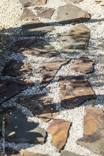 A path of old stones, vertically.
