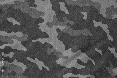Textile camouflage uniform background pattern in black and white.