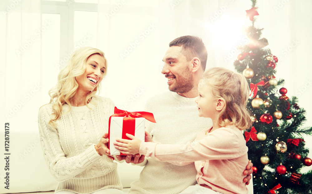 happy family at home with christmas gift box