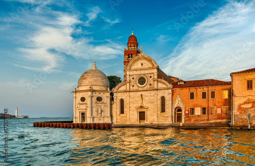 Church San Michele in Isola Venice Italy at background blue sky