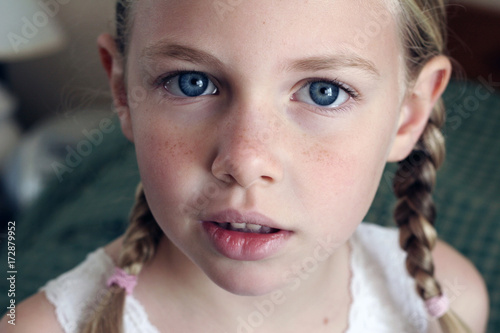 Fair Skinned, Freckled Face Blonde in Braids photo