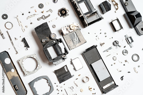 Neatly Organized Parts of Analog Camera photo