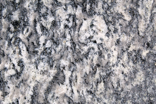 Obraz na plátně Granite like metamorphic rock seen in detail from above