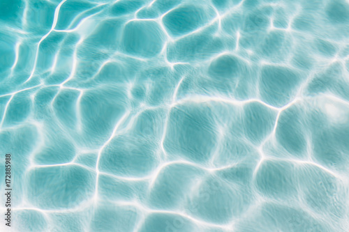 Ripples And Light Pattern On Water Of Aqua Blue Pool photo