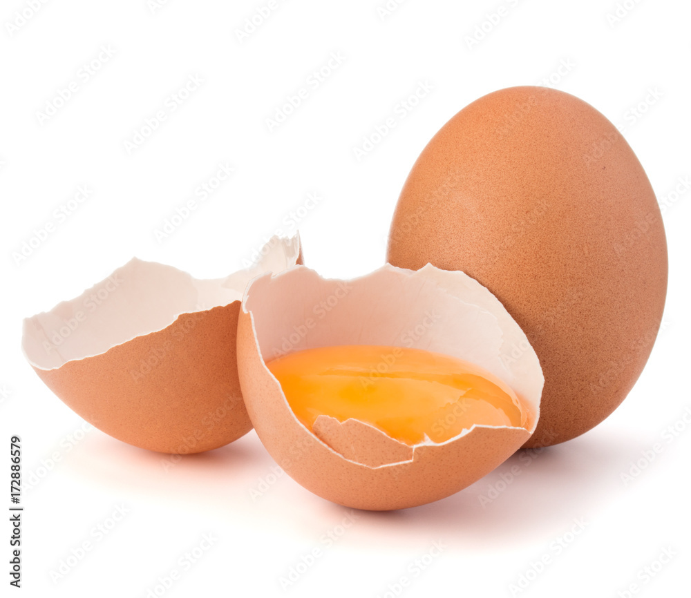 Broken egg in eggshell half and raw egg isolated on white background cutout Broken egg in eggshell half and raw egg isolated on white background cutout