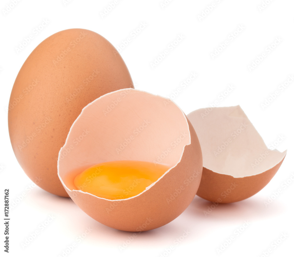Broken egg in eggshell half and raw egg isolated on white background cutout Broken egg in eggshell half and raw egg isolated on white background cutout