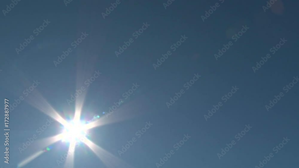 August 21, 2017 time lapse at sunrise as moon covers sun during solar eclipse with airplane contrails passing through sky, wide angle. August 21, 2017 time lapse at sunrise as moon covers sun during solar eclipse with airplane contrails passing through sky, wide angle.