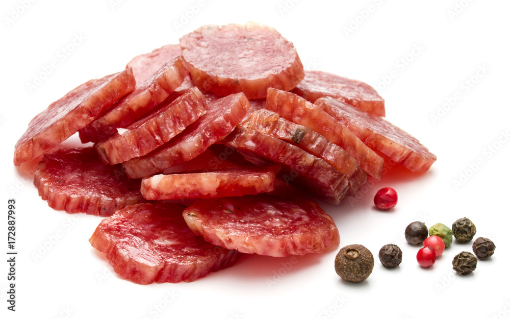 Salami smoked sausage slices and peppercorns isolated on white background cutout Salami smoked sausage slices and peppercorns isolated on white background cutout
