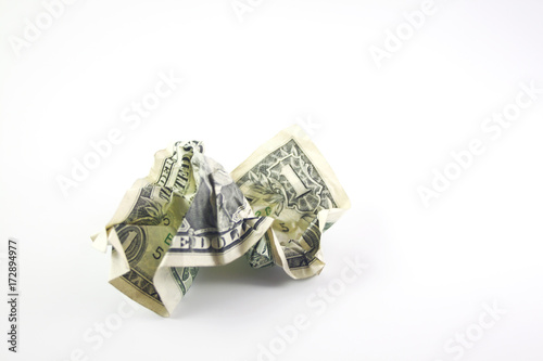 Crushed one dollar bill close up isolated