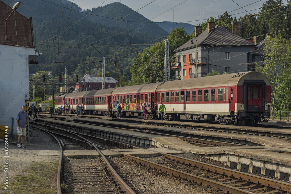 Red fast train in Slovakia station Ruzomberok