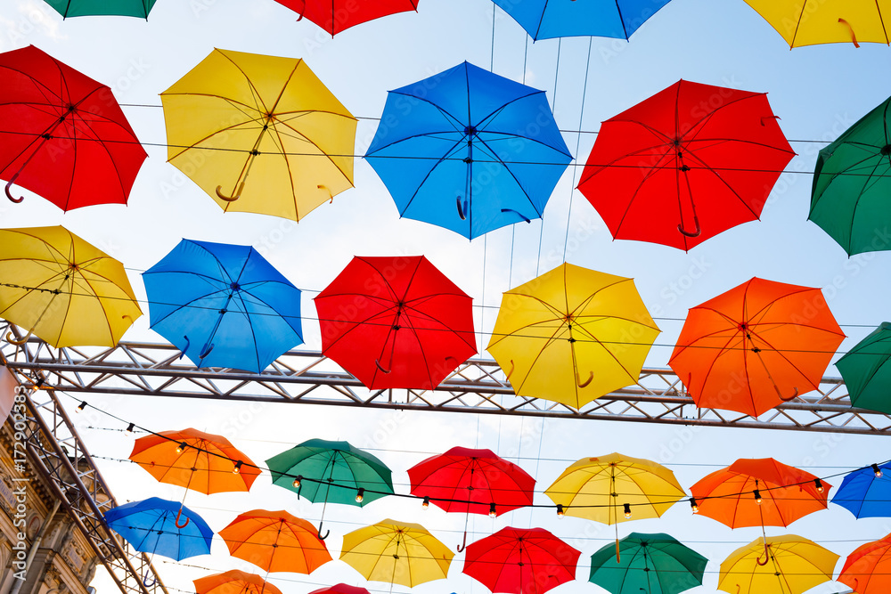 multicolor umbrellas in the sky