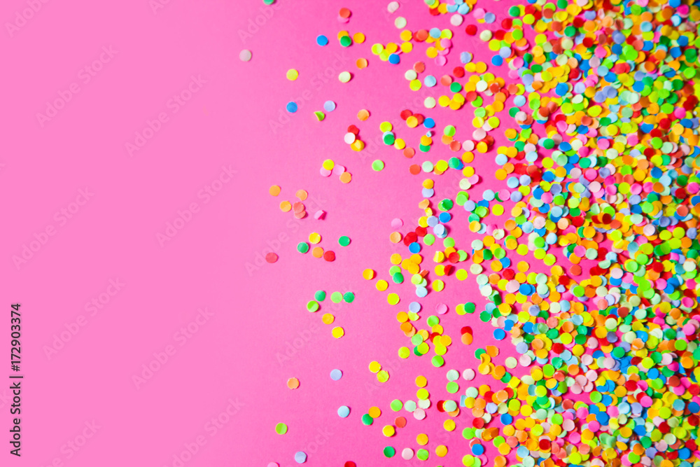 Frame made of colored confetti. Pink background. - obrazy, fototapety, plakaty 