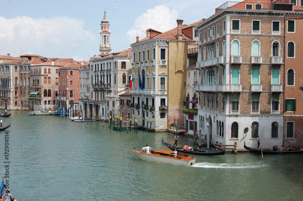 Naklejka premium Gondola on the Grand Canal near Palazzo Dario in Venice Italy