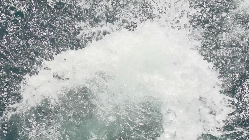 A shot of a diver that dove into the deep blue water of the ocean. The diver is wearing a complete diving equipment. A shot of a diver that dove into the deep blue water of the ocean. The diver is wearing a complete diving equipment.