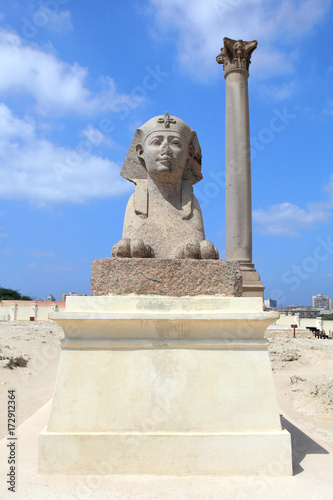 Sphinx and Pompey's pillar, landmark ancient monument in Alexandria, Egypt
