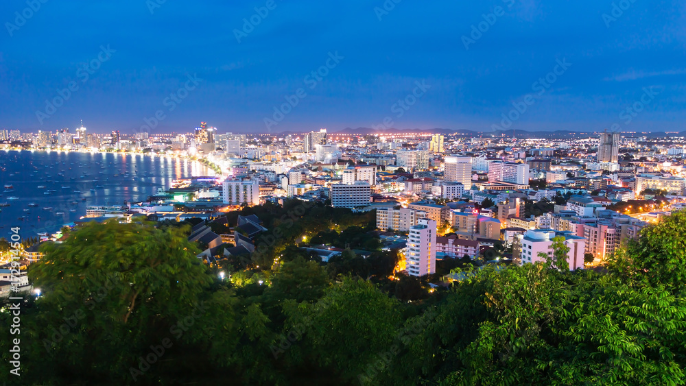 The building and skyscrapers in twilight time in Pattaya,Thailand.