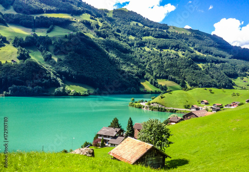 Colorful view of Thunersee (Lake Thun) in a beautiful summer day, Thun, Switzerland, Europe. photo