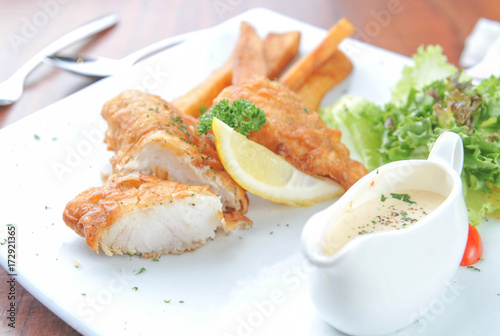 fish on a plate with chips