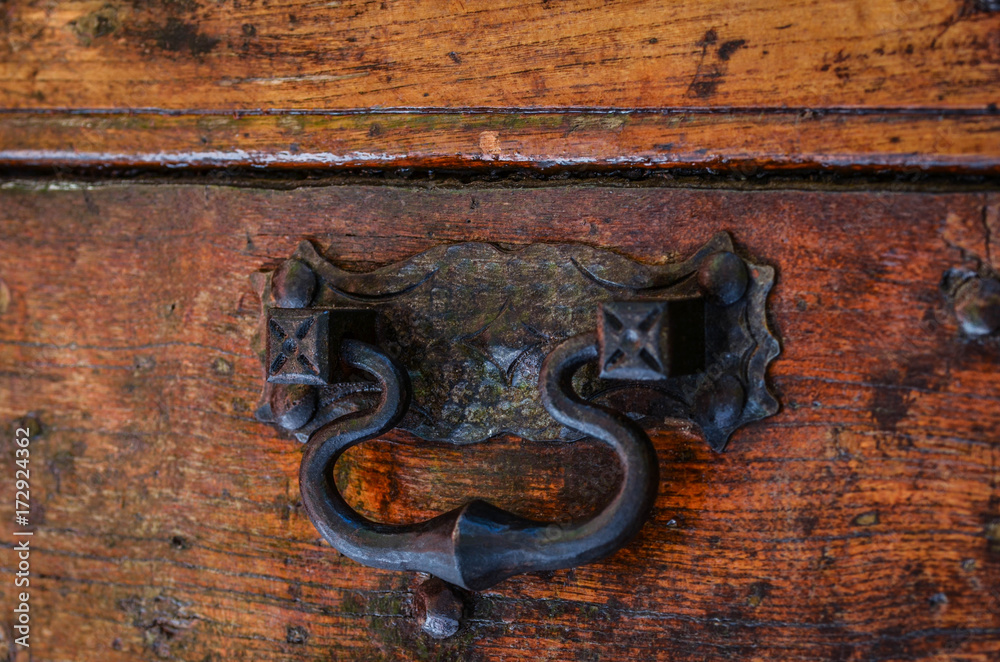 ancient doors close up - door details, knob, wood structure, iron texture ancient doors close up - door details, knob, wood structure, iron texture