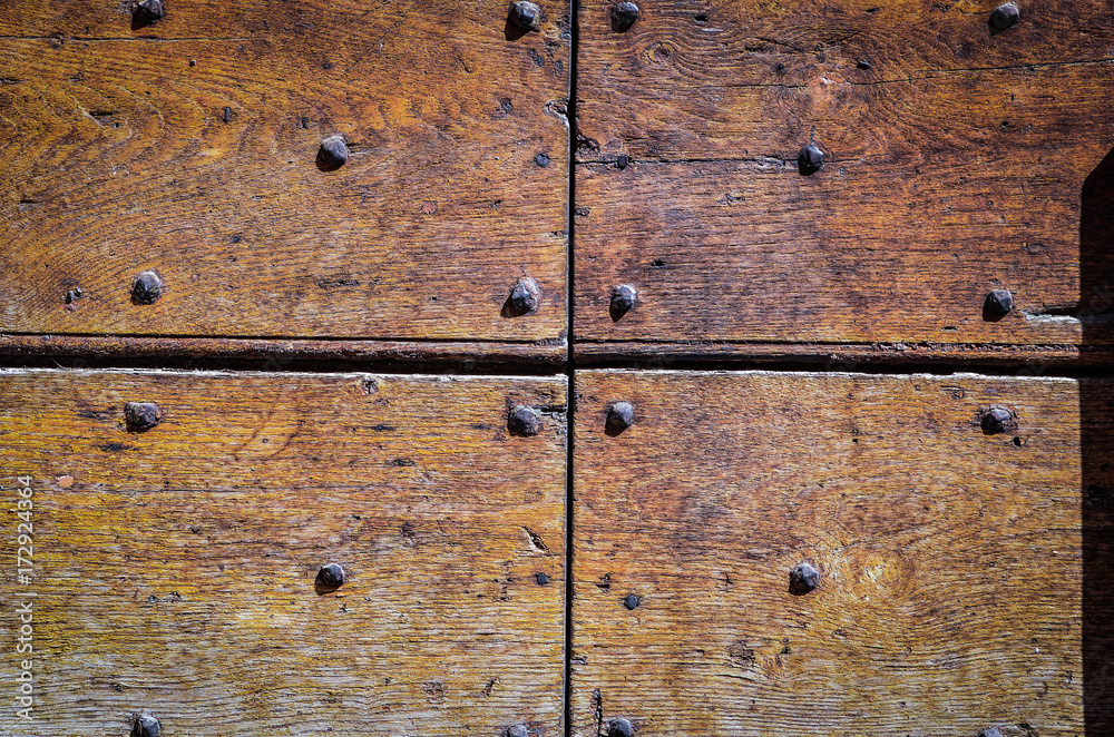 ancient doors close up - door details, knob, wood structure, iron texture ancient doors close up - door details, knob, wood structure, iron texture
