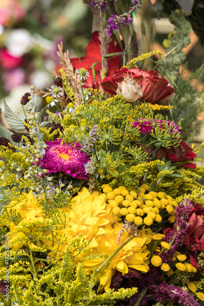 Fototapeta premium handmade beautiful bouquets from flowers and herbs