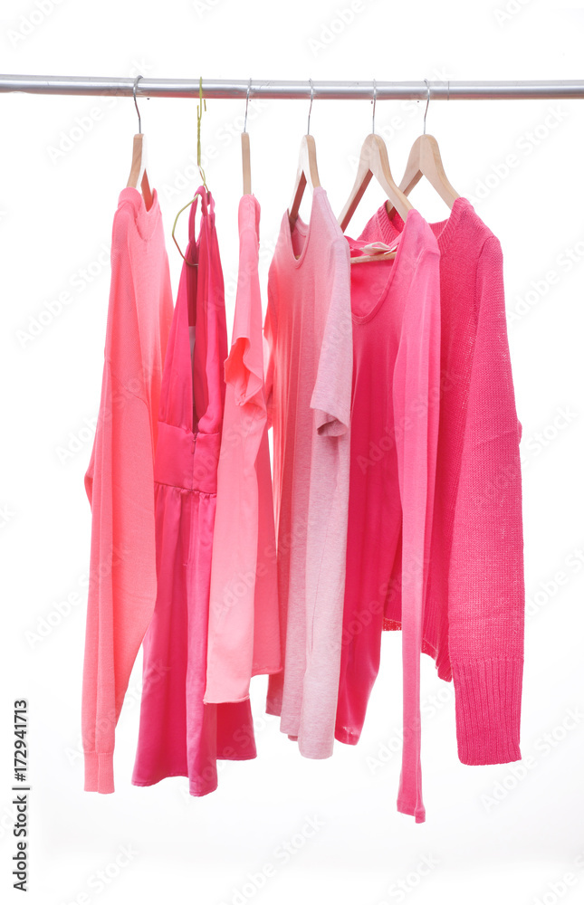 row of pink shirt on a hanger –on white background row of pink shirt on a hanger –on white background