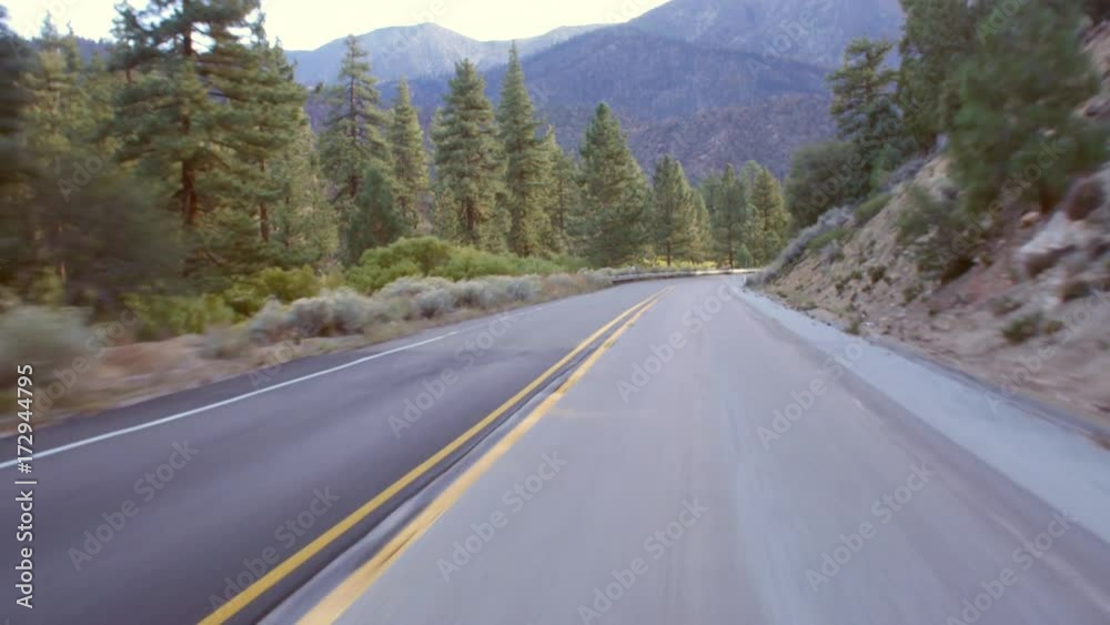 Drivers POV on highway in California, USA, with lens flare, shot on R3D