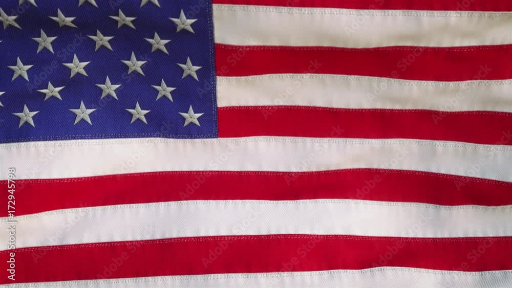 American flag waving in the wind. The majestic Stars and Strips gently and reverently sways in the breeze, while filling the whole frame. See portfolio for similar and much more! American flag waving in the wind. The majestic Stars and Strips gently and reverently sways in the breeze, while filling the whole frame. See portfolio for similar and much more!