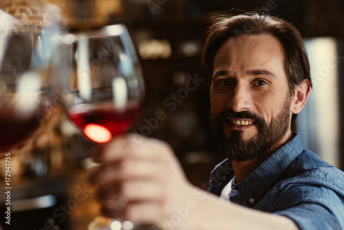 bearded man with wine glass