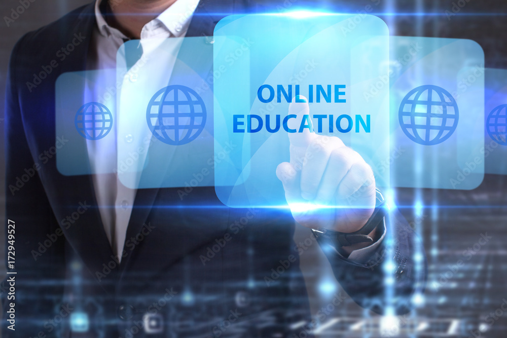 The concept of business, technology, the Internet and the network. The young entrepreneur has found what he needs: Online education The concept of business, technology, the Internet and the network. The young entrepreneur has found what he needs: Online education