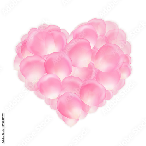 Pink rose petals in the shape of heart for romantic greetings.
