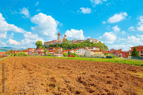 Nozzano Castello and its agricultural crops, medieval village in Tuscany photo