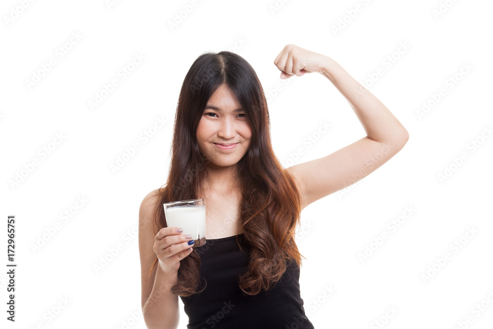 Healthy Asian woman drinking a glass of milk. Healthy Asian woman drinking a glass of milk.