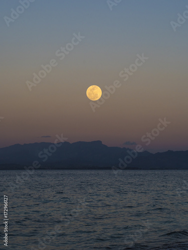 View of the Moon setting from Bounty Island  Fiji