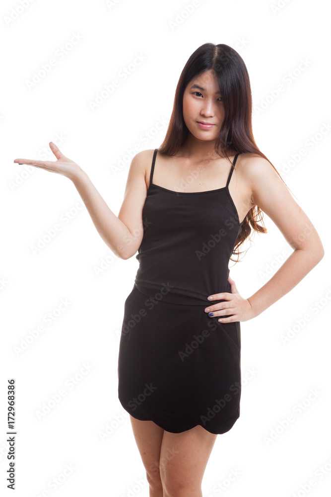 Young Asian woman present with her hand. Young Asian woman present with her hand.