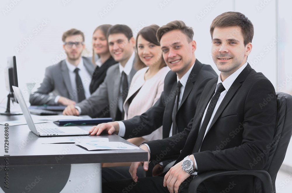 project Manager and professional business team sitting at Desk project Manager and professional business team sitting at Desk