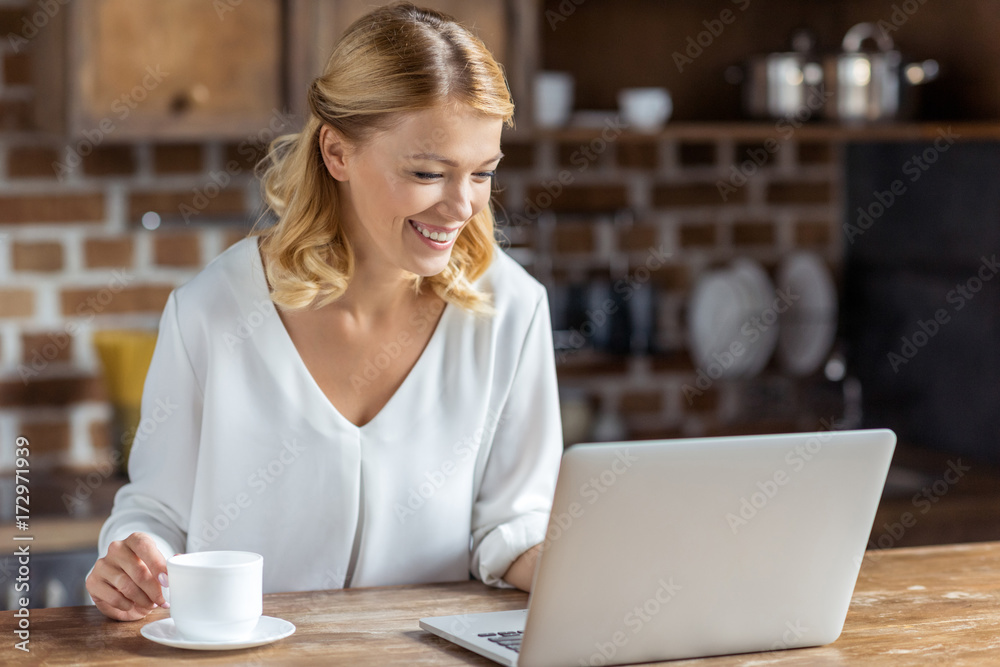 woman using laptop woman using laptop