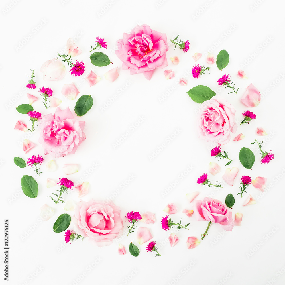 Found frame with pink flowers, roses and leaves on white background. Flat lay, top view. Frame background