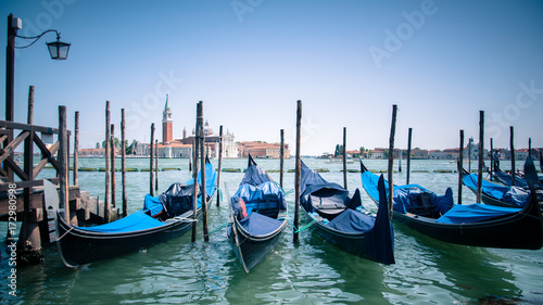 Gondolas moored, Venice © Joe