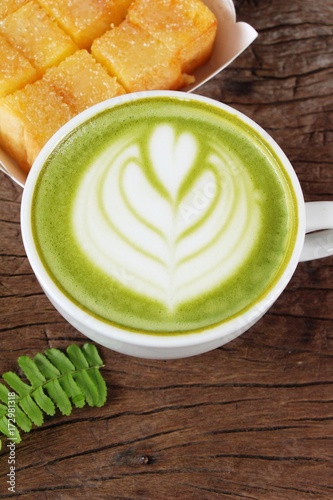 Hot green tea with matcha and toast