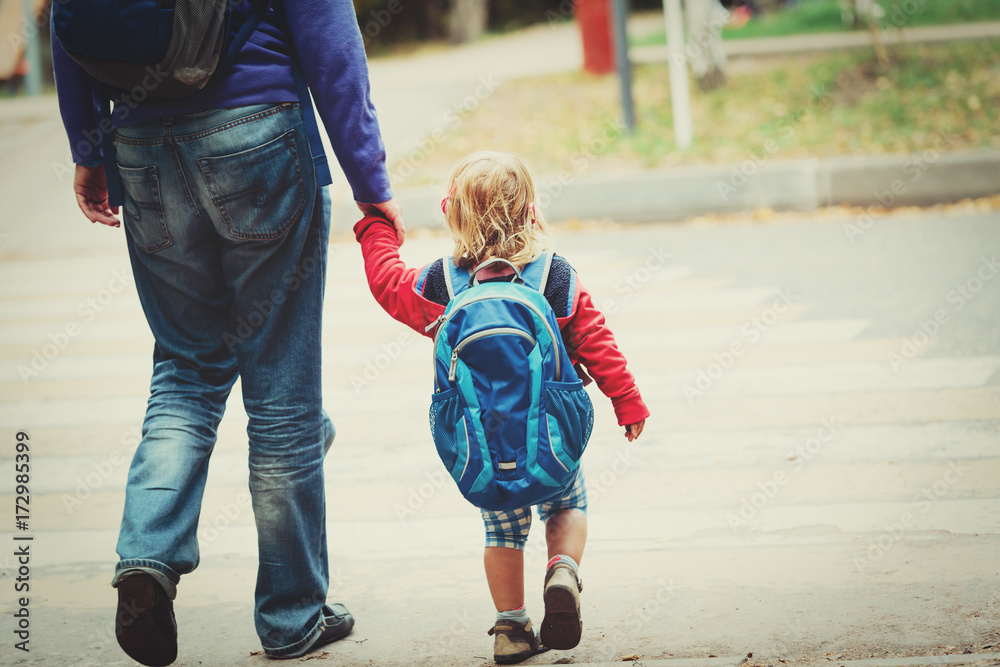 father and little daughter go to school or daycare father and little daughter go to school or daycare