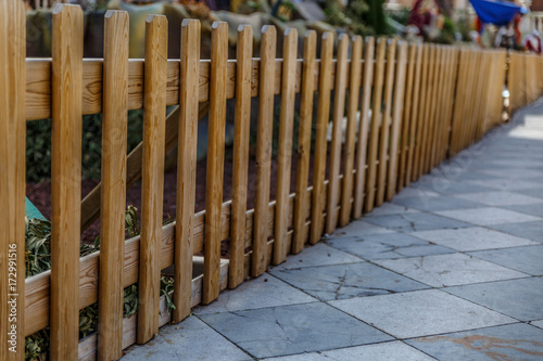 Wooden fence surrounding a manger