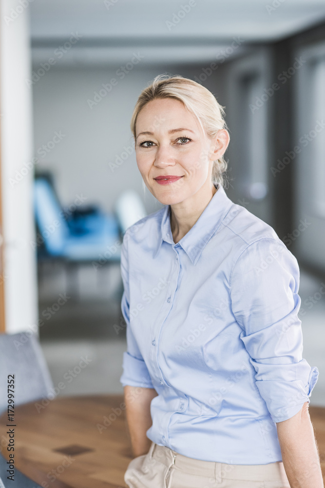 Portrait of confident businesswoman in office Portrait of confident businesswoman in office