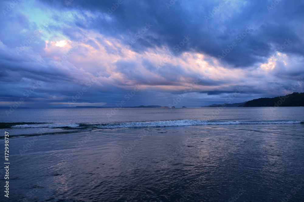 Fototapeta premium Dramatic cloud sunset over the Pacific Ocean from the beaches of Costa Rica as Hurricane Otto approaches, November 2016